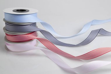Ribbons rolls in various colors clipart