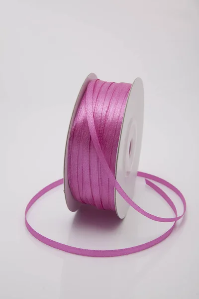 Bubblegum pink color ribbon roll — Stock Photo, Image