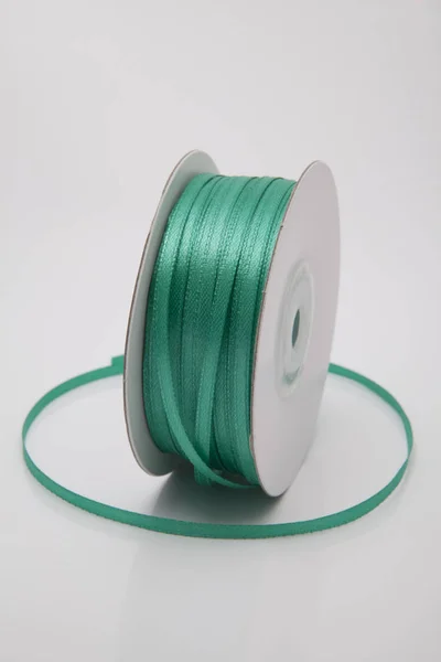 Dark mint green color ribbon roll — Stock Photo, Image