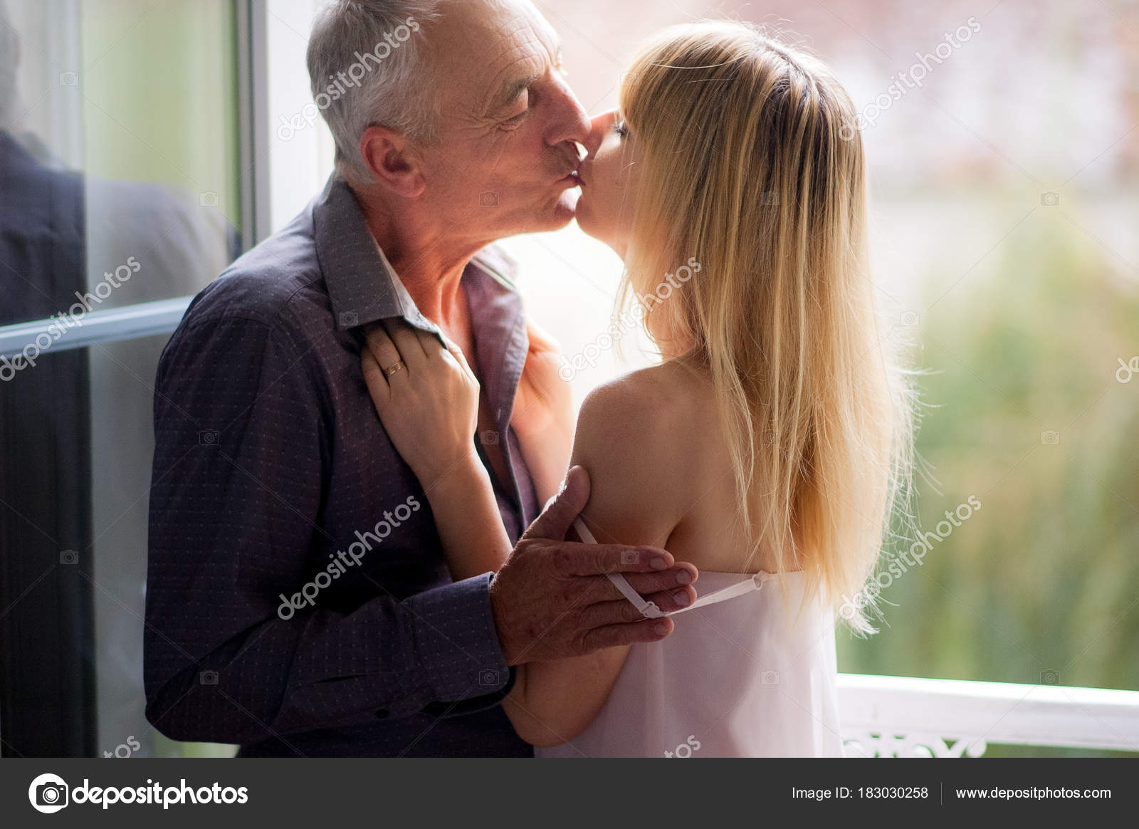 Old Man Young Girl Kiss