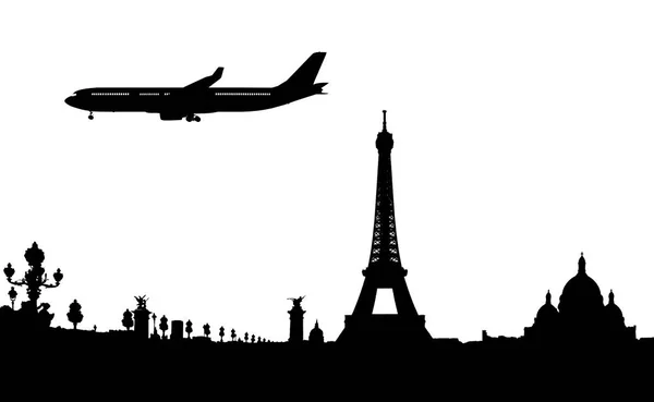 パリと飛行機の着陸のシルエット ロイヤリティフリーのストック画像