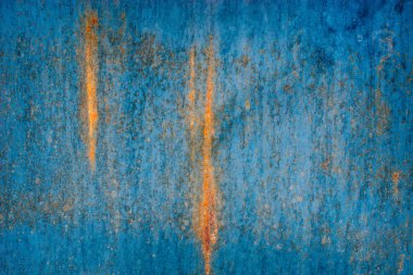 Paslı metal doku mavi sarı. Korozyon ve parlak geçişler pas demir kapı yakın çekim yüzeyi. Soyut inşaat grunge arka plan.