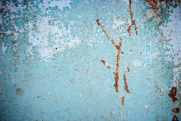 Textura azul abstracta con grietas grunge. Pintura agrietada en una superficie metálica. Fondo urbano con transiciones de pintura áspera. Las grietas grunge fondo urbano —  Fotos de Stock
