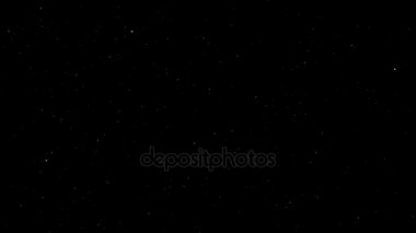 Gece gökyüzü üzerinde birçok yıldız yanıp sönme ve sol hareket