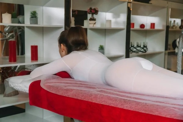 Girl on LPG massage session in beauty salon. Woman enjoys massage — 스톡 사진