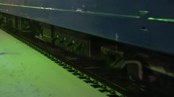 Heavy snow fall at railroad tracks. Train at night light of railway station — 비디오