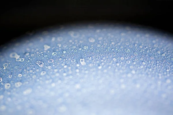 Macro on a soap bubble before it pops