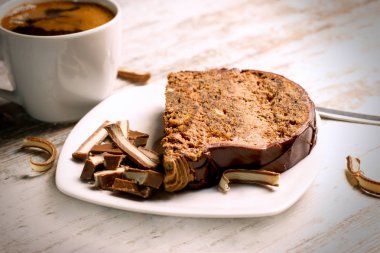 Chocolate cake and cup of coffee