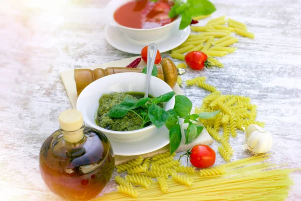 Homemade basil pesto sauce and tomato sauce on table — Stock Photo, Image