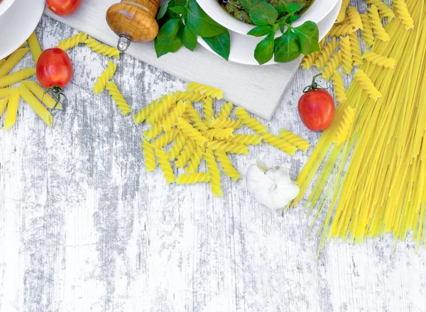 Pasta, macaroni and basil pesto sauce — Stock Photo, Image
