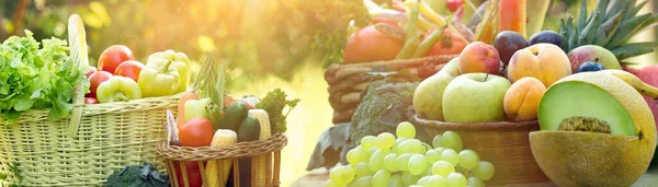 Fruit and vegetable in wicker basket, healthy organic and vegetarian food