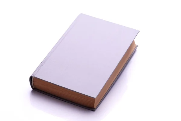 Un libro grigio isolato su bianco — Foto Stock