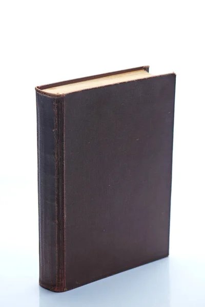 One old book stands on white — Stock Photo, Image