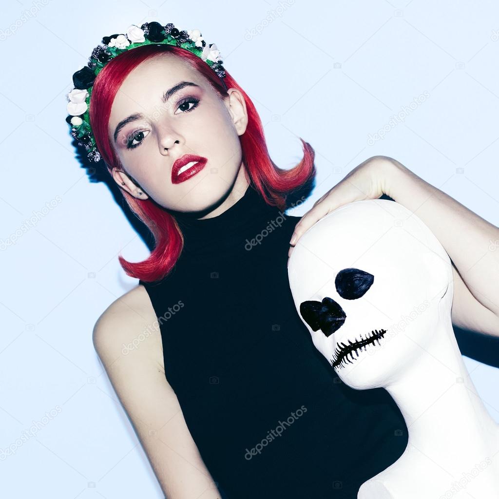 Girl Gothic style with floral wreath red hair and stylish manneq