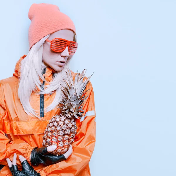 Girl with snow pineapple fashion orange clothes party style