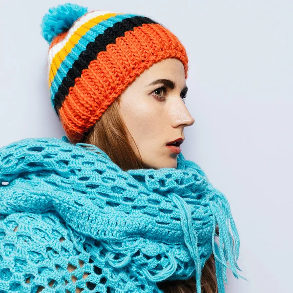 Brunette girl Pom pom hat and knitted scarf. Warm fashion access — Stock Photo, Image