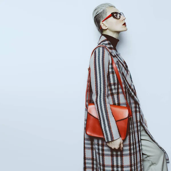 Stylish Lady fashion vintage glasses and checkered coat Trend wo — Stock Photo, Image