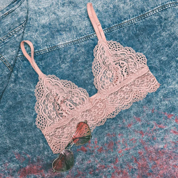 Stylish underwear on denim background. Beautiful lace. Fashion t — Stock Photo, Image