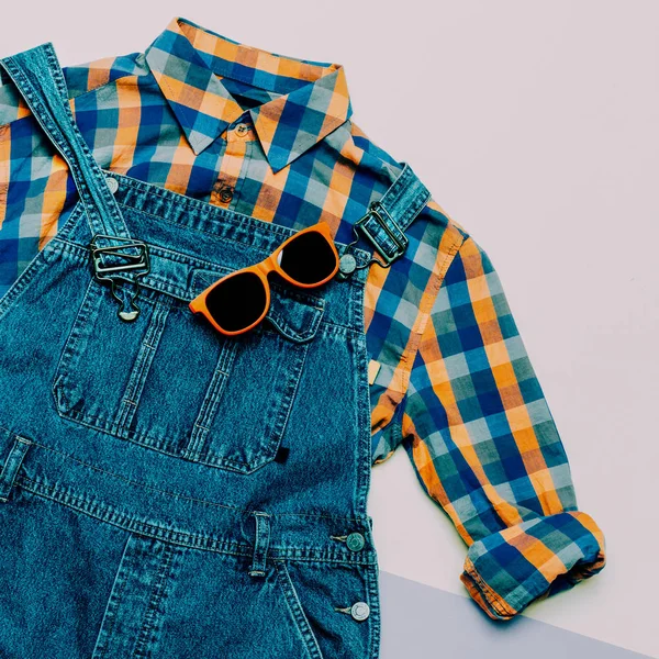 Fashionable denim overalls. Stylish clothes. Minimal Country fas