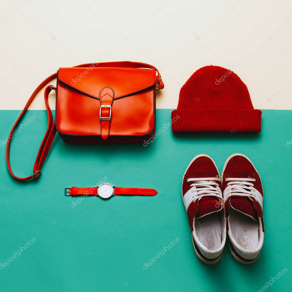 Stylish accessories and clothing. Focus on red. Handbags, caps, 
