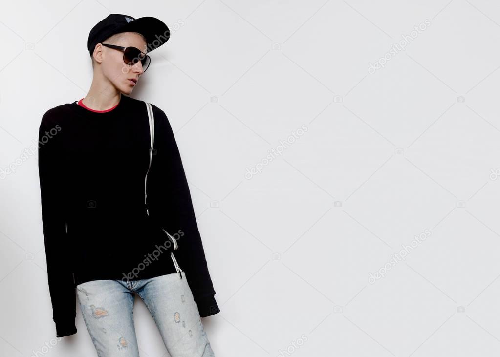 Tomboy Model Urban Outfit cap and Hoodie Fashion Trend