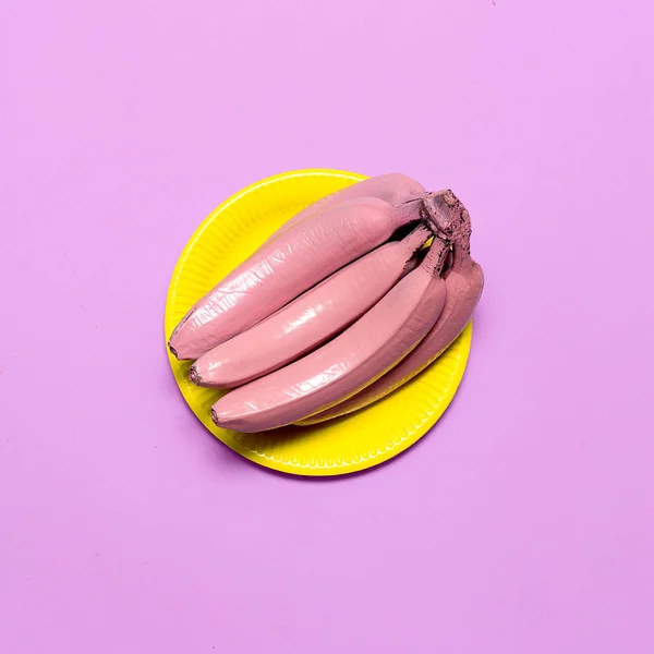 Bananas in pink paint Surreal minimal ar — Stock Photo, Image