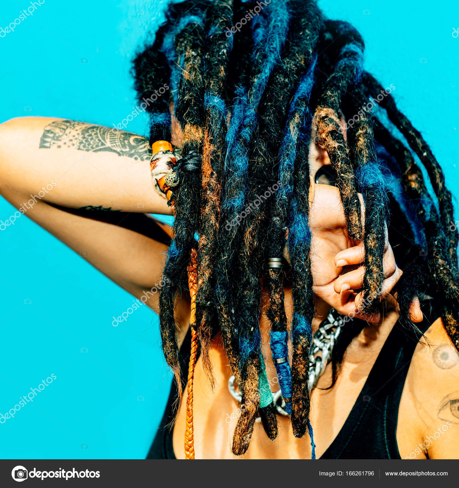 Rasta Latino Girl With Dreadlocks Piercings Tattoos And