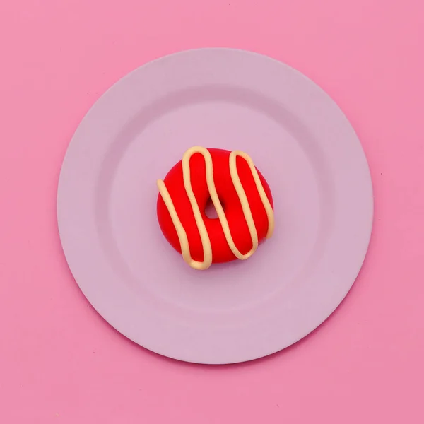 Donut. Acostado. Arte minimalista de caramelos. Dulces vibraciones de vainilla — Foto de Stock