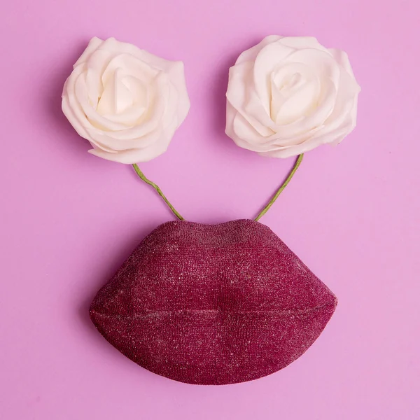 Funny lips and flowers. Aroma and cosmetics concept