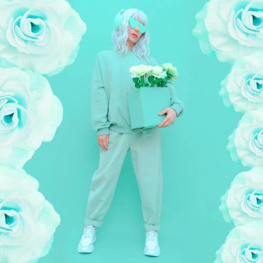 Çiçekler Nane Şekeri Dj kızı. Monokrom renk trendleri. Aqua Menthe estetiği. Şık kulaklıklar, müzik severler konsepti.