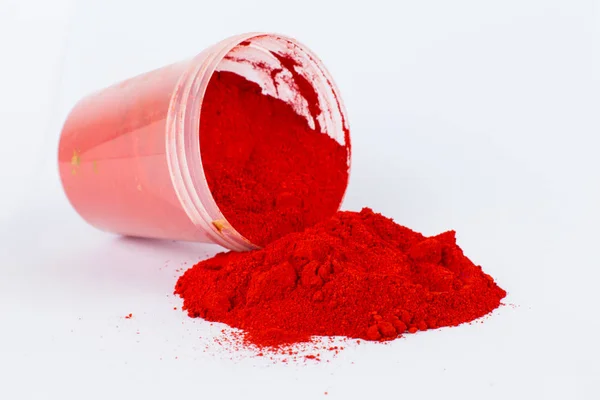 red pigment on a white background