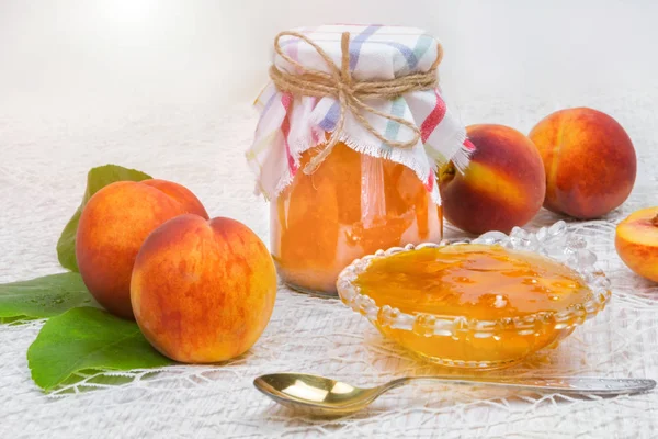 Peach jam in the jar on the table — Stock Photo, Image