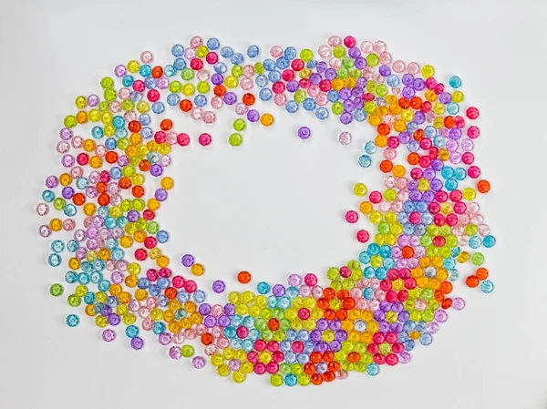 Background of colored beads on a white background — Stock Photo, Image