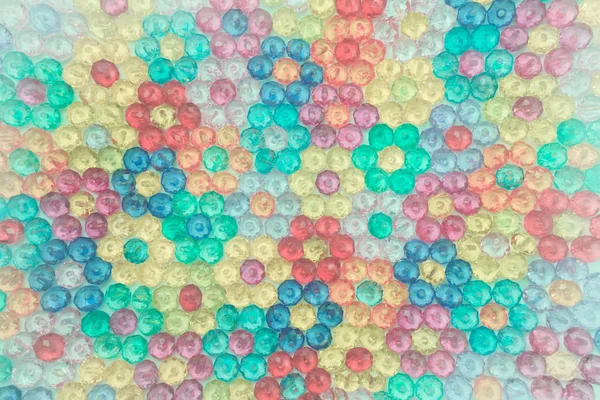 Fundo de contas coloridas, fundo de flores feitas de contas coloridas — Fotografia de Stock