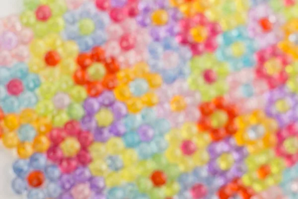 Background, colored beads blurred image — Stock Photo, Image