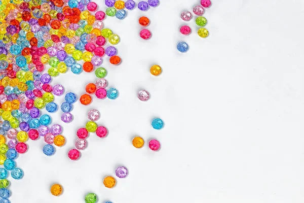 Background of colored beads on a white background — Stock Photo, Image