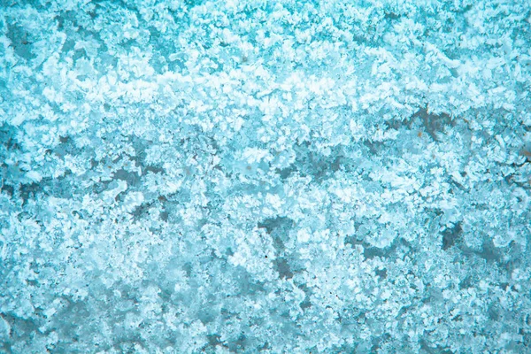 Texture del gelo. ghiaccio congelato sull'erba. inverno hoarfrost sfondo — Foto Stock