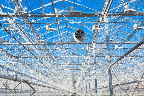 Empty greenhouse. Electric ventilators — Stock Photo, Image