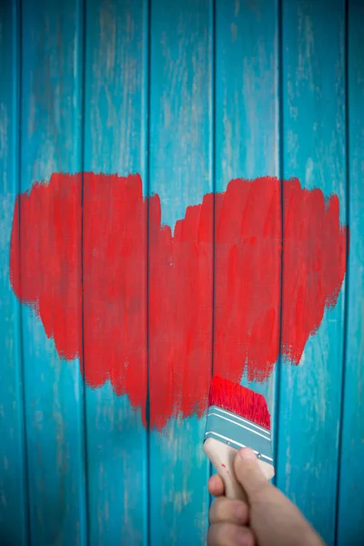 Hand painting big red heart — Stock Photo, Image