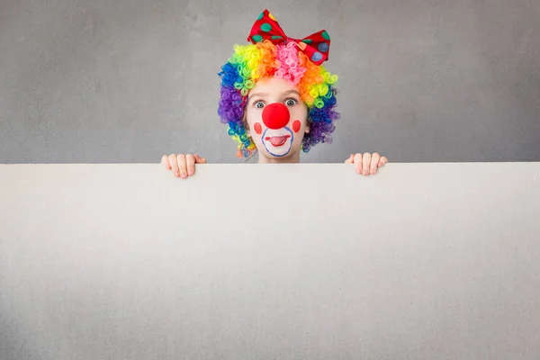 Funny kid clown playing indoor — Stock Photo, Image