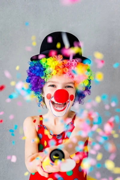 Funny kid clown playing indoor — Stock Photo, Image