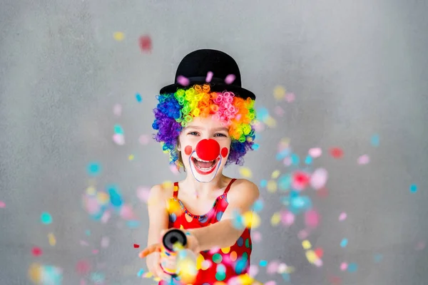 Funny kid clown playing indoor — Stock Photo, Image