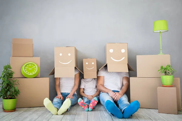 Family playing into new home — Stock Photo, Image