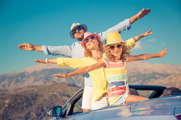 Happy family travel by car in the mountains — Stock Photo, Image