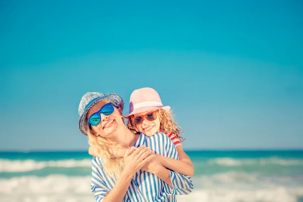 Happy family having fun on summer vacation — Stock Photo, Image