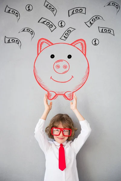 Child playing with piggy bank — Stock Photo, Image
