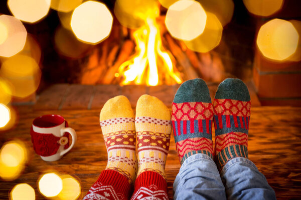 feet in warm christmas socks
