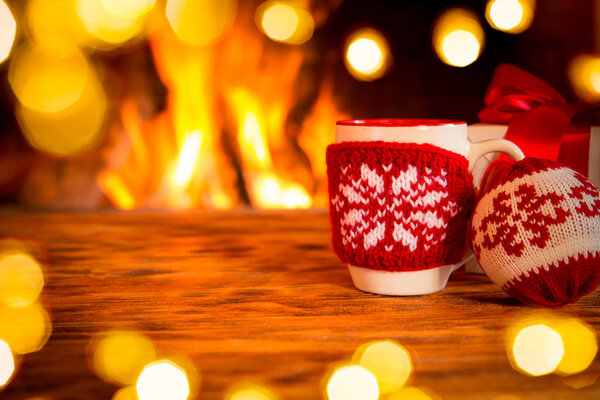 cup in knitted cover