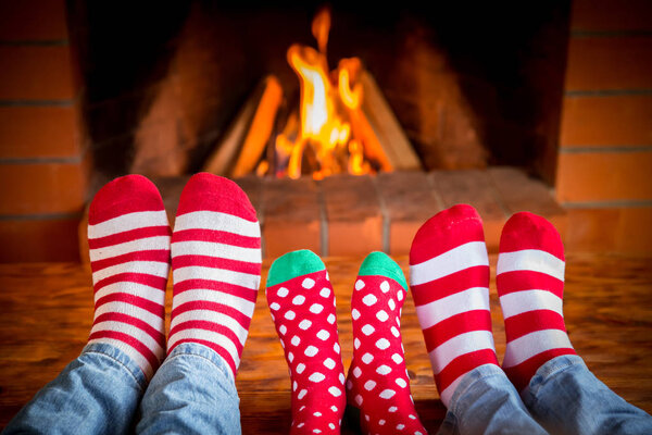 feet in warm christmas socks