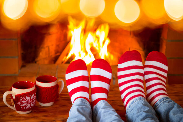 feet in warm christmas socks